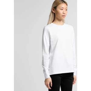 A long-sleeved white T-shirt on a model, featuring a simple design with a logo.
