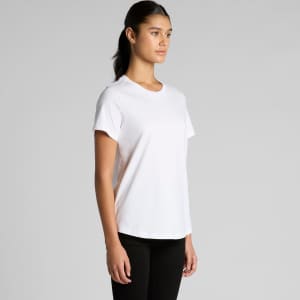 A white t-shirt featuring short sleeves and a loose fit, displayed on a model in profile.