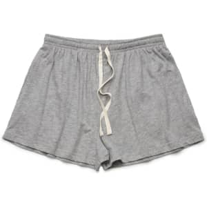 Grey sports shorts with an elastic waistband and drawstring, featuring a logo on one side.