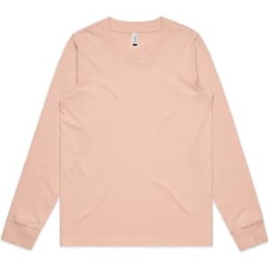 A long-sleeve t-shirt in a soft peach colour, featuring a plain design and a round neckline. It has branding on the tag.