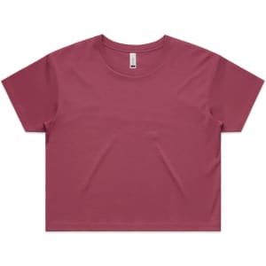 A maroon cropped tee shirt with a relaxed fit and short sleeves. It features a logo on the neckline.