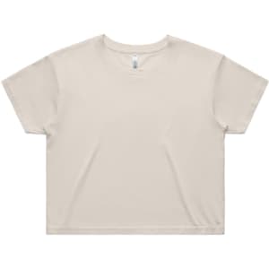 A light beige crop tee with a relaxed fit, featuring a simple design and a logo on the label.