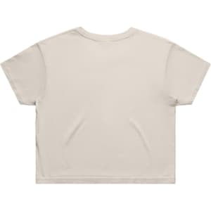A beige crop tee with a simple design, featuring short sleeves and a slightly oversized fit. It has a logo.
