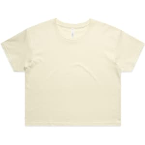A cropped t-shirt in a soft cream colour, featuring short sleeves and a simple design. It has a logo.