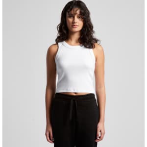 A white ribbed crop tank top is displayed on a model, paired with black pants. The top features a round neckline and a fitted style.