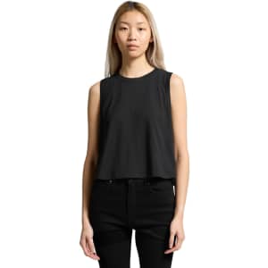 A black crop tank top with a sleeveless design and a relaxed fit, featuring a small logo.