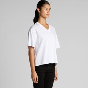 A white V-neck tee with short sleeves displayed on a model, featuring a casual fit. The tee has a logo.