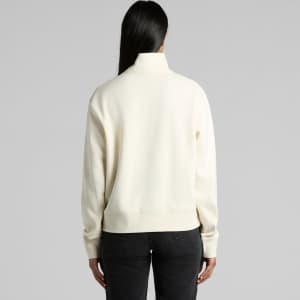 A cream-coloured half zip crew jumper with a relaxed fit, featuring a sleek design and a branding logo.