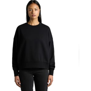 A black sweater with a relaxed fit and long sleeves, featuring a simple design and a logo.