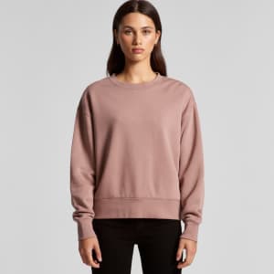 A casual mauve jumper with a relaxed fit and long sleeves, featuring a simple design and a logo.