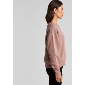 A crew jumper in a muted mauve colour, featuring a simple design and a logo on the side.