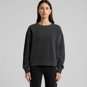 A faded black crew jumper with a relaxed fit and long sleeves, featuring a simple design and a logo.