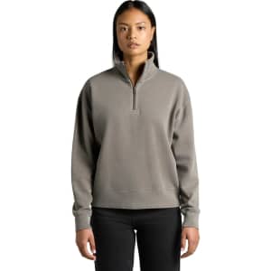A faded grey half-zip jacket with a relaxed fit and long sleeves, featuring a small collar and logo.