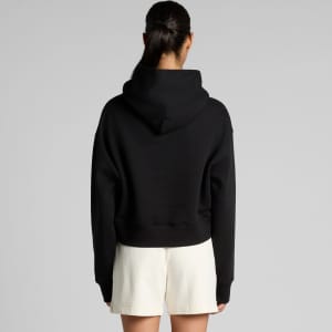 A black crop hoodie with a snug fit and a large hood, featuring a branding logo on the back.