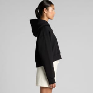 A black cropped hoodie with a large hood, displayed on a model from the side.
