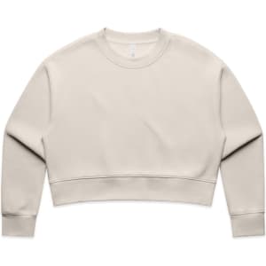 A cream-coloured cropped jumper with a crew neckline and long sleeves. It features a simple design and has a logo.