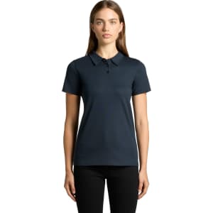 A navy blue polo shirt with a collar and buttons, featuring a logo on the chest.