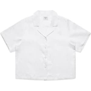 A white button-up shirt with short sleeves and a collar, featuring a logo on the label.