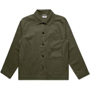 An olive green chore jacket featuring a collar, front buttons, and multiple pockets. It has a logo on the label.