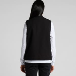 A black heavy canvas vest with a simple design, featuring a back view and no visible logos.