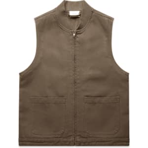 A brown canvas heavy vest with a zipped front and two front pockets, featuring a logo.