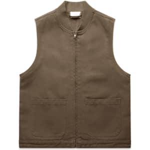 A brown canvas vest with a zip front and two front pockets, featuring a logo on the upper back.