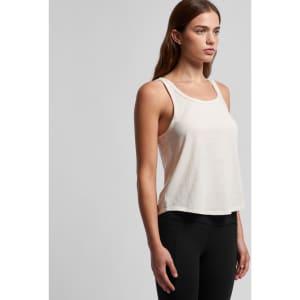 A light beige racerback singlet with a relaxed fit, featuring a logo on the side.
