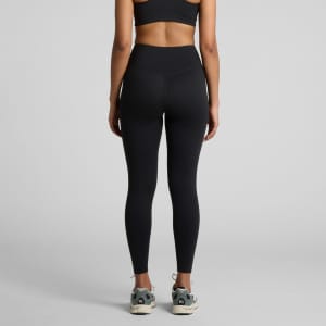 Black active seamless leggings are displayed, featuring a high waistband and a sleek fit. The image includes a brand logo.