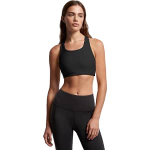 A black bra top with a racerback design, paired with matching high-waisted leggings. The design features a logo.