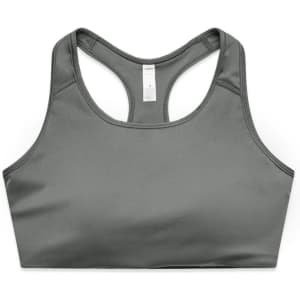 A grey sports crop top featuring a racerback design, with stitching details and a logo.