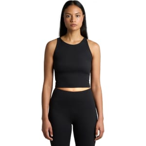 A black crop tank top with a fitted design, styled with a model wearing matching high-waisted leggings.