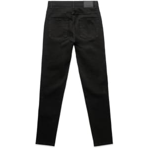 A pair of black skinny jeans viewed from the back, featuring two back pockets and a tag at the waistband.