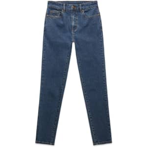 Skinny jeans in a deep blue denim, featuring a high waist and five pockets, with a logo on the waistband.