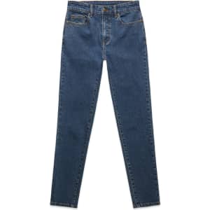 Skinny jeans in a dark blue wash with a fitted silhouette and contrasting stitching. Features pockets and a waistband.