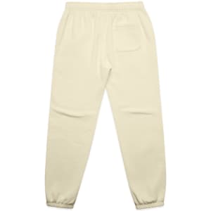 Cream-coloured track pants with an elastic waistband and ankle cuffs, featuring a single back pocket.