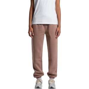 Relax Track Pants in a soft beige colour, featuring a relaxed fit and cuffs at the ankles. Includes branding.