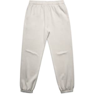 Faded track pants in a light beige colour, featuring an elasticated waistband and cuffed hems. Includes branding.