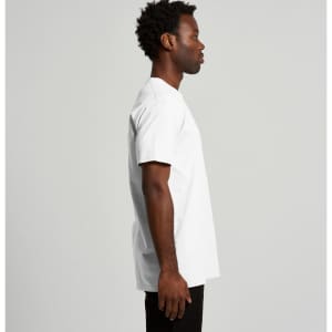 A white t-shirt is displayed on a model, featuring a relaxed fit and a side view. The shirt has a logo.