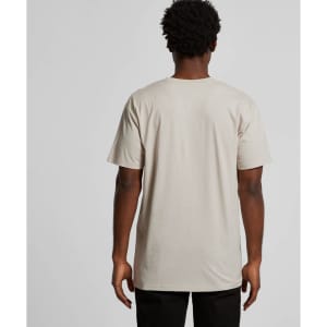 A beige T-shirt viewed from the back, featuring short sleeves and a regular fit. It has a logo visible on the back.