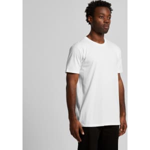 A white organic T-shirt worn by a model standing against a plain background. The shirt has a logo on it.
