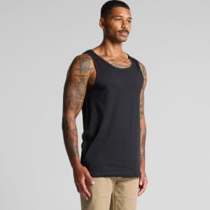 A black singlet worn by a tattooed man, featuring a simple design and a close-fitting style.