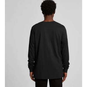 A black long-sleeve t-shirt with a logo on the back, modelled by a person facing away from the camera.