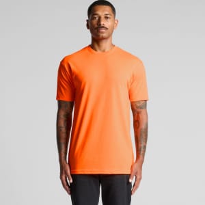 An orange work t-shirt with a simple design and a logo on the chest, displayed on a model.