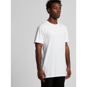A man wears a plain white t-shirt with short sleeves, featuring a logo. The tee is designed for a relaxed fit.