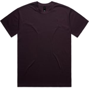 A dark purple t-shirt displayed flat, featuring a simple design and a label inside. The shirt has a relaxed fit.