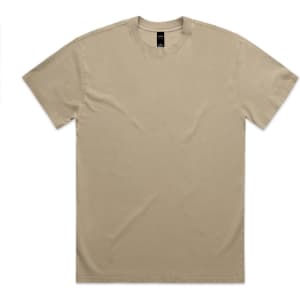 A beige Heavy Faded Tee with a simple design, featuring a logo on the label.