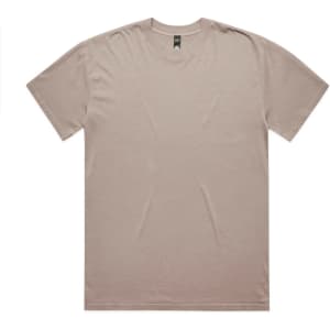 A heavy faded tee in a muted beige colour, featuring a relaxed fit and a simple design. It has a logo.