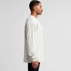 A long-sleeve, faded tee in light grey, displayed from the side with a model featuring a branded logo.
