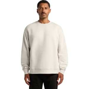 A light grey sweater featuring a crew neckline and long sleeves. It has a logo on the front.