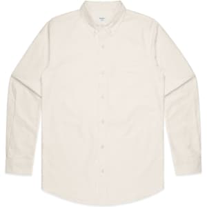 A cream-coloured button-up shirt with long sleeves and a single chest pocket, featuring a logo on the label.